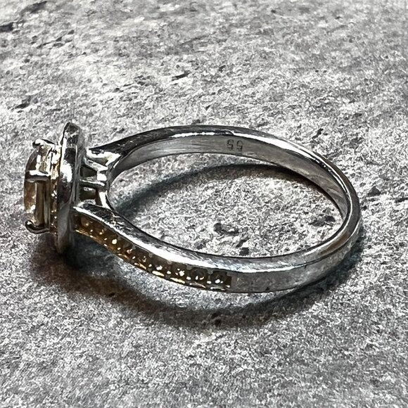 Size 7 ring, stamped 55, clear stones silver color band - Picture 4 of 11